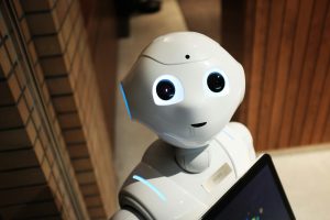 Tambs Digital Marketing A futuristic humanoid robot in an indoor Tokyo setting, showcasing modern technology.